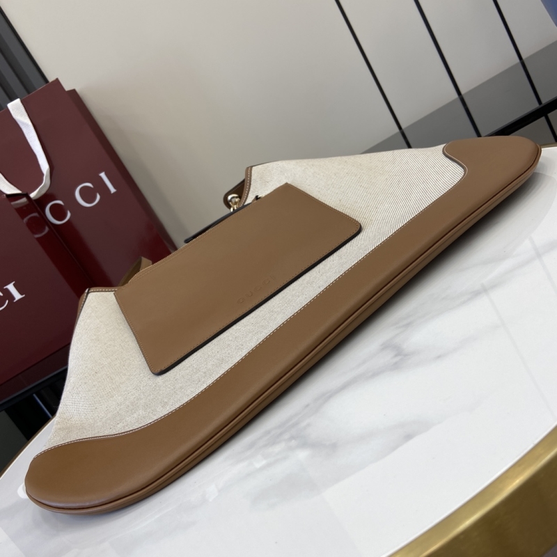 G*u*i top handle bags